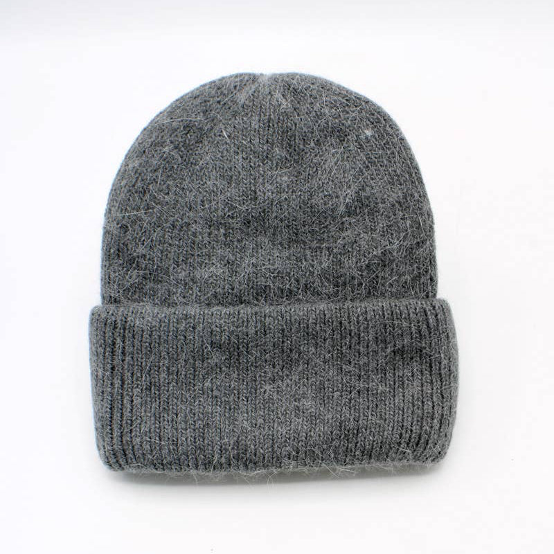 Gray knit beanie on a white background