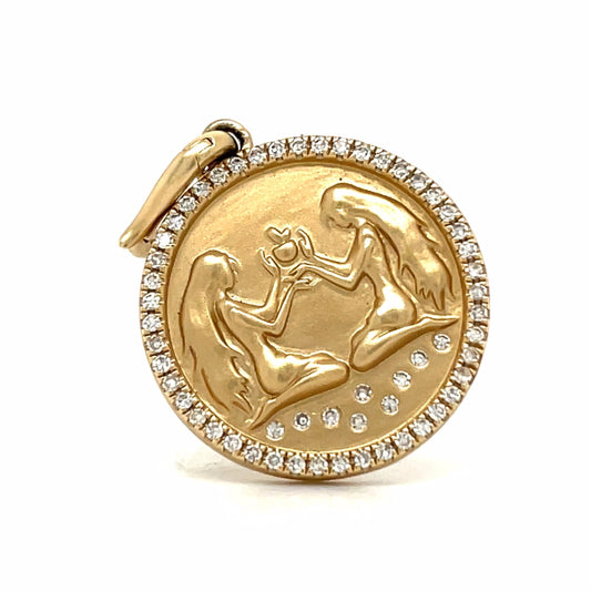 CLOSE UP OF GEMINI CHARM