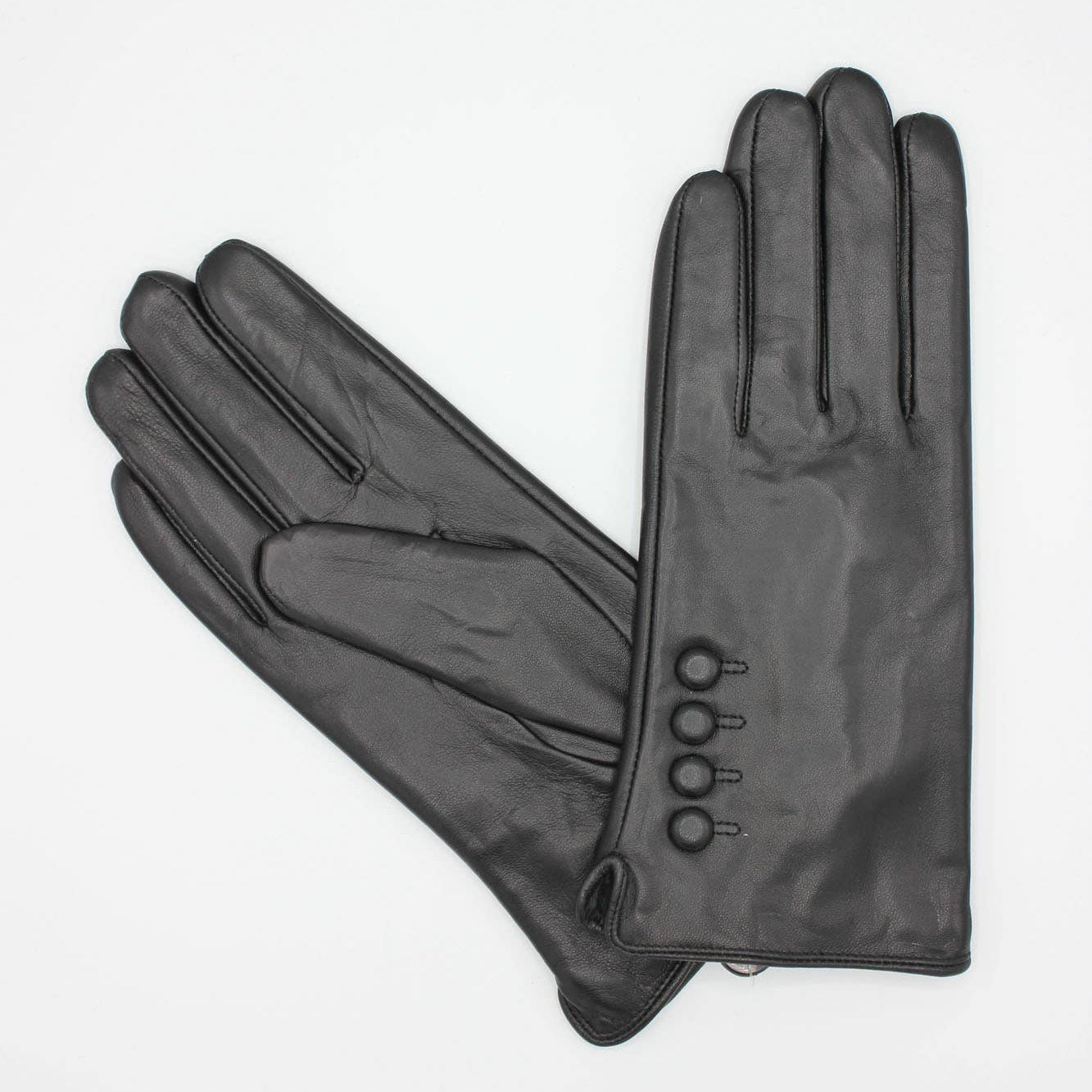 Pair of gray gloves with button details on a white background