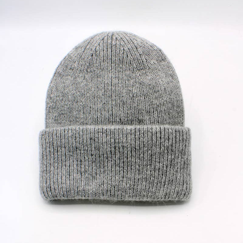 Gray knit beanie on a white background