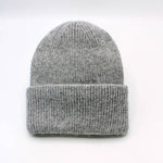 Gray knit beanie on a white background