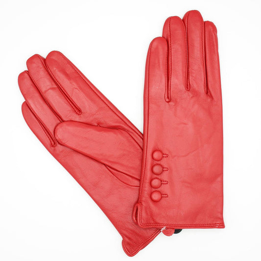 Pair of red leather gloves on a white background