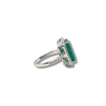 Emerald and diamond halo ring