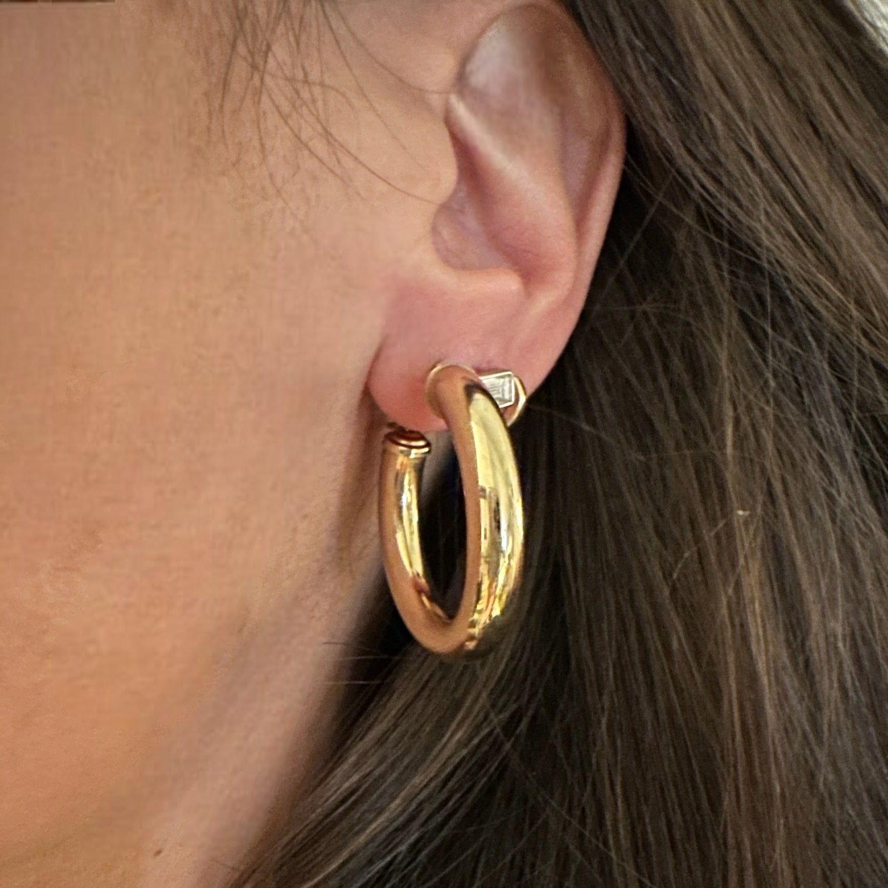 medium hoops on the ear