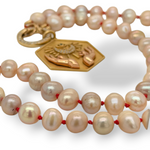 Pearl on Red Silk