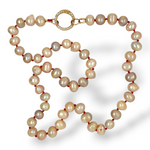 Pearl on Red Silk