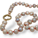 Pearl on Red Silk