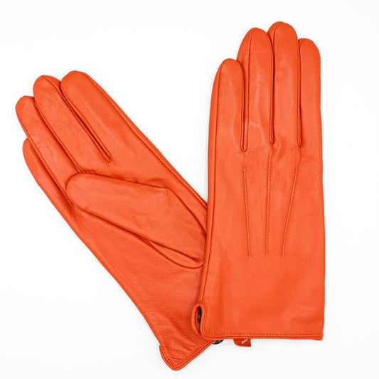 Pair of orange gloves on a white background